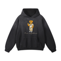 Black hoodie with a teddy bear graphic and 'Pure Confidence' text on a white background