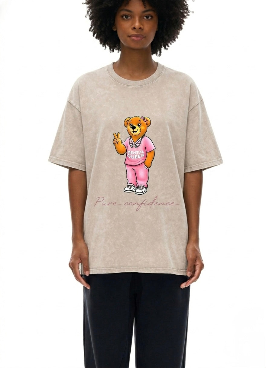 Person wearing a beige t-shirt with a bear graphic and text on a white background