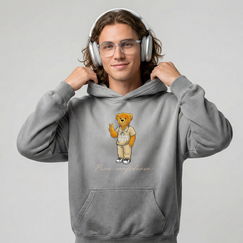 Person wearing a gray hoodie with a bear graphic and text, on a light gray background