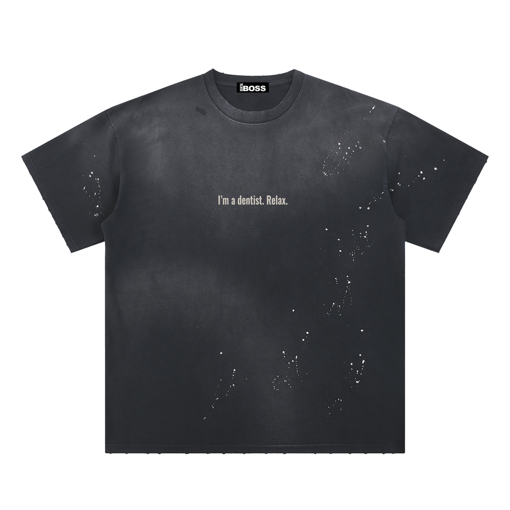 Black t-shirt with text 'I'm a dentist. Relax.' on a white background
